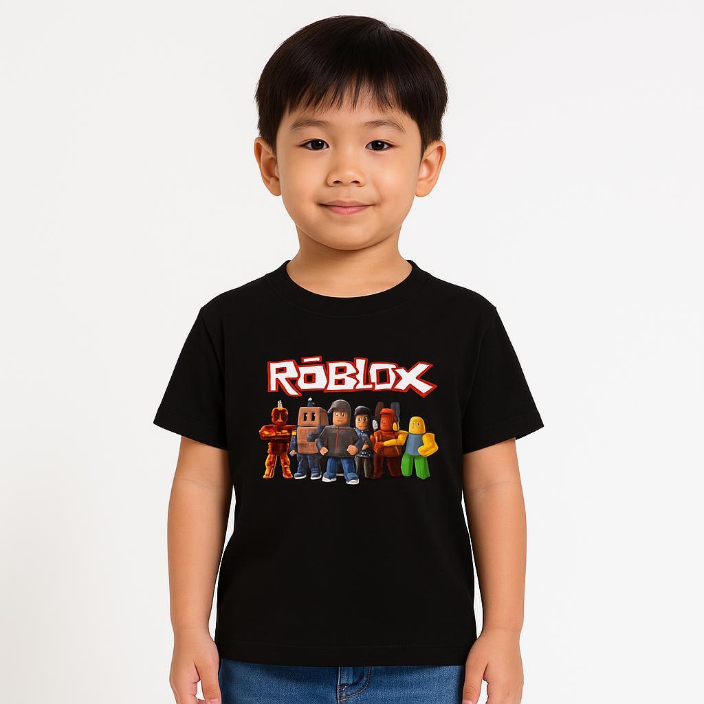 Young boy wearing a black Roblox t-shirt featuring the Roblox logo and game character lineup